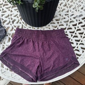 Athleta women’s size M “printed mesh racer run short 4”